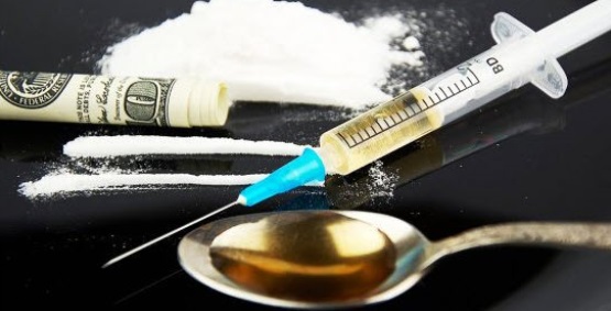 opioid needle with spoon, cocaine and money