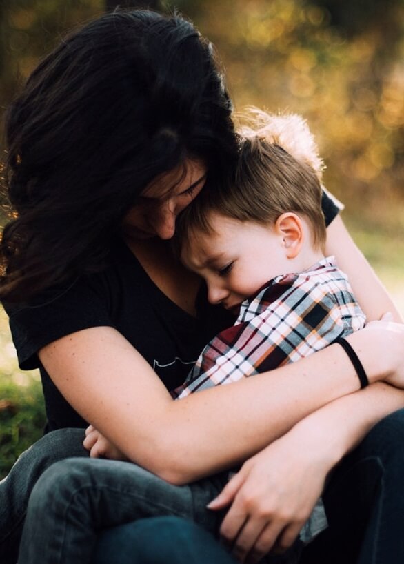 Mother holding child