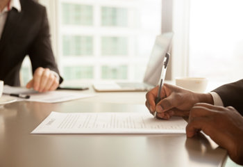 Client sitting with child custody attorney