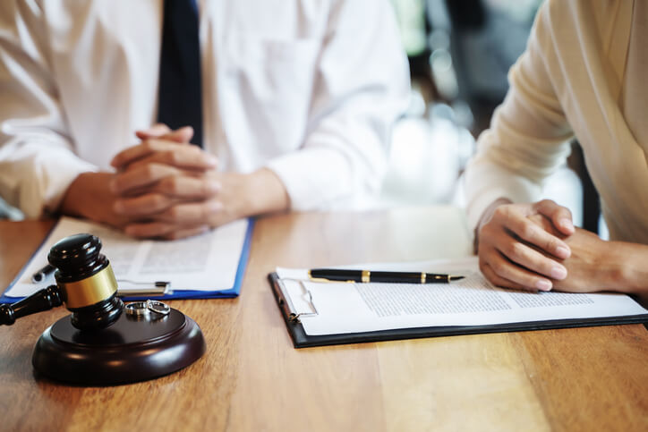 Couple sitting with attorney looking for annulment